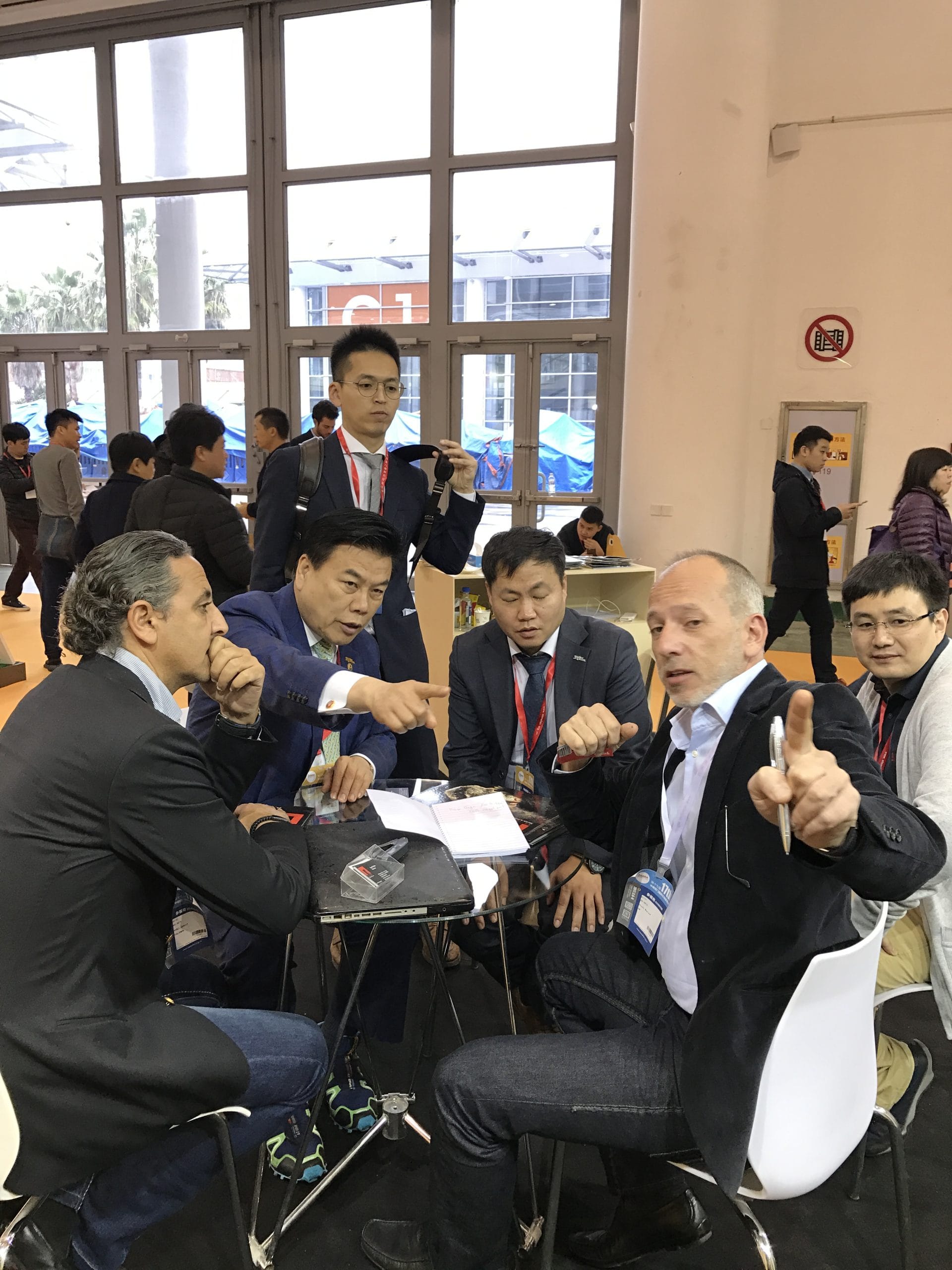 Businesspeople collaborating at a trade show or conference