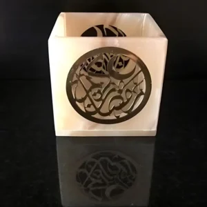 Elegant onyx box with ornate Arabic calligraphy cutout
