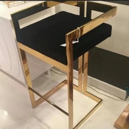 Gold metal bar stool with black velvet seat