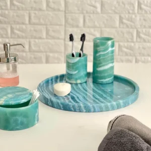 Teal marble bathroom tray with soap dish, toothbrush holder, and cotton swab container.