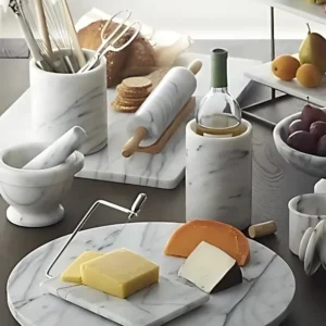 Marble kitchenware and cheese board with wine.
