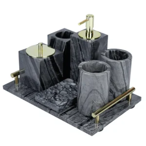 Gray marble bathroom set with gold accents on tray