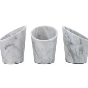 Three marble containers, angled differently, ideal for kitchen organization.