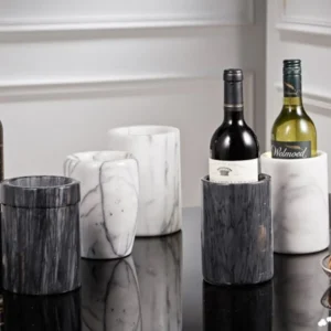 Marble wine coolers and bottles on a table