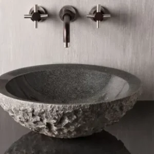 004 Granite Vessel Sink: Modern, dark gray granite bathroom sink with a unique textured finish.