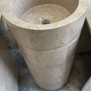0015 Beige Stone Pedestal Sink: Modern bathroom sink crafted from beige stone, featuring a round basin and elegant pedestal base.