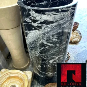 0017: Elegant black and white marble pedestal sink for bathroom vanity. Features striking veining.