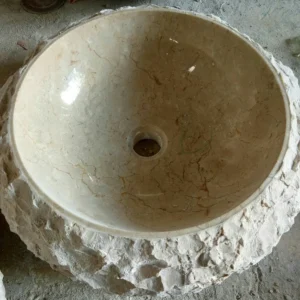 Handcrafted 009 Marble Sink: Rustic beige stone sink with a polished bowl and rough exterior.