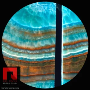 00015 Blue Onyx Circular Slab: Stunning teal, blue & orange-brown banded stone, perfect for decorative applications.