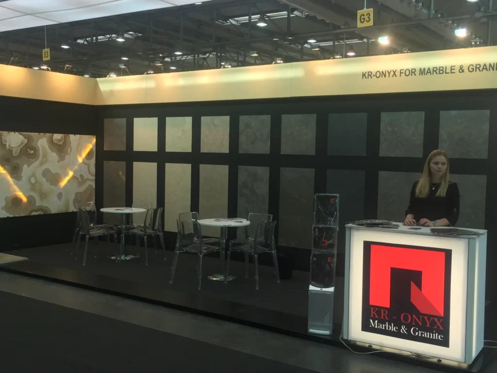 KR-ONYX Marble & Granite Trade Show Booth: showcasing various marble and granite samples at an exhibition.