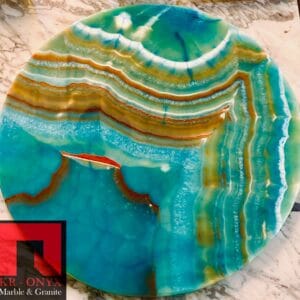 0040: Stunning round onyx table top with teal, orange, and gold veining. Perfect decorative accent.